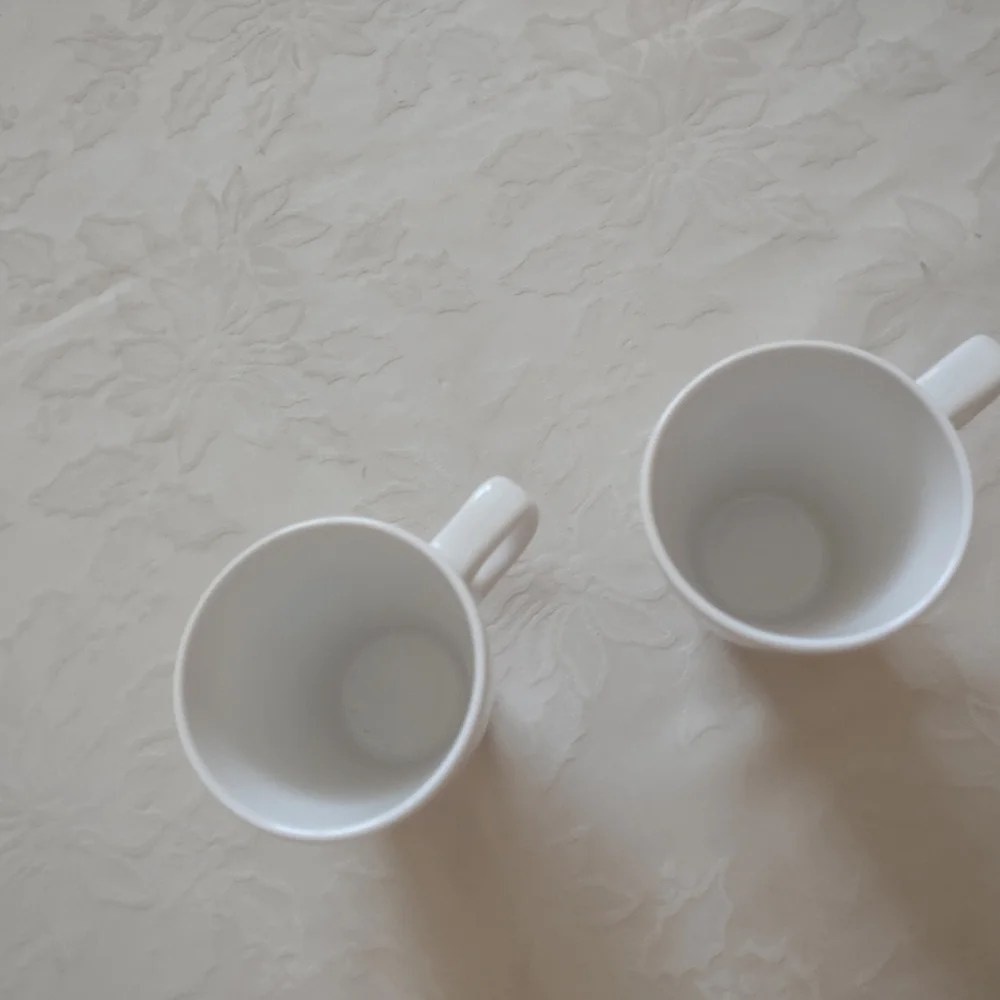 2 white tall cups mugs IKEA Sweden coffee tea